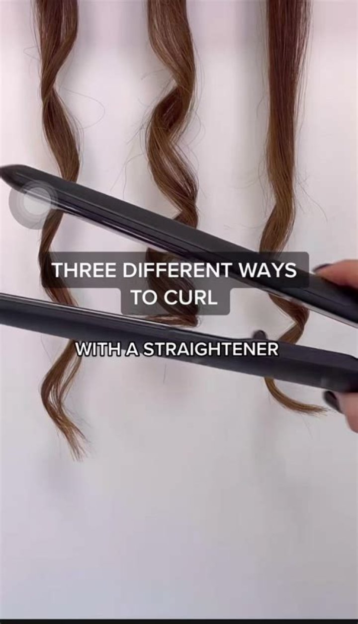 How do you pin curl your hair with a curling iron?